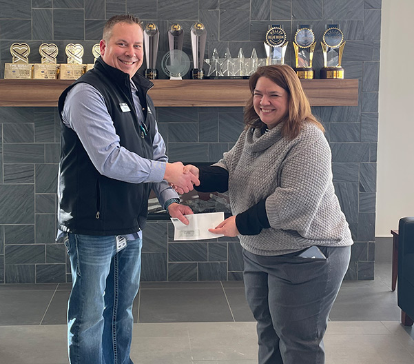 Handing over check