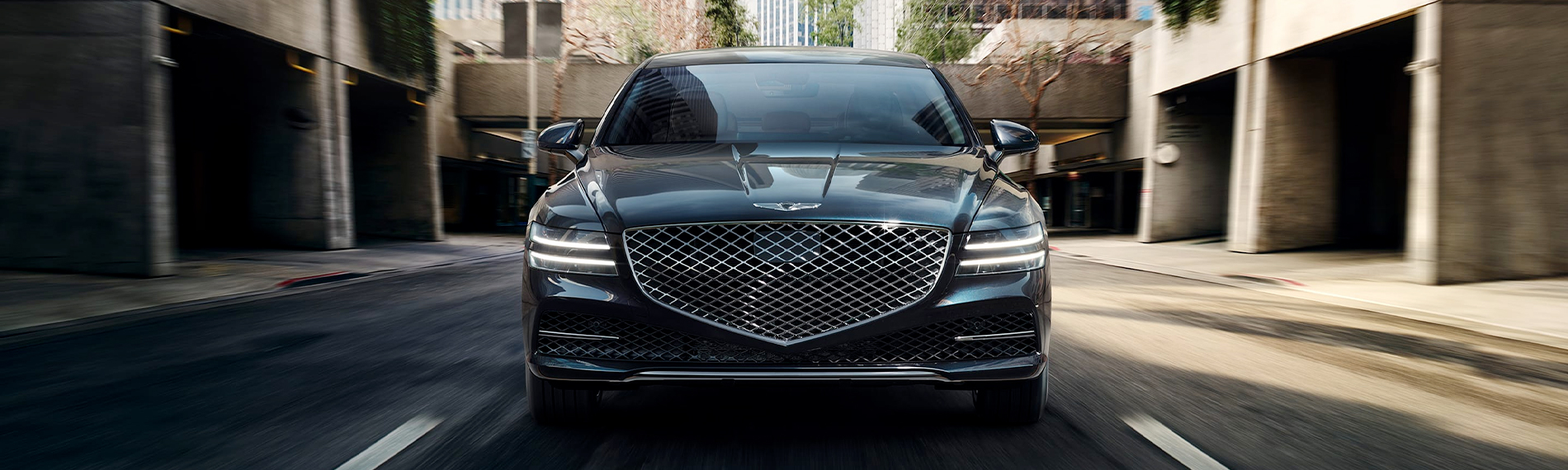 2023 Genesis G80 shown in Tasman Blue.