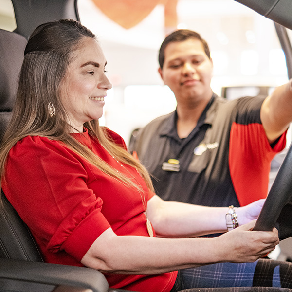 Woman in car driver's seat