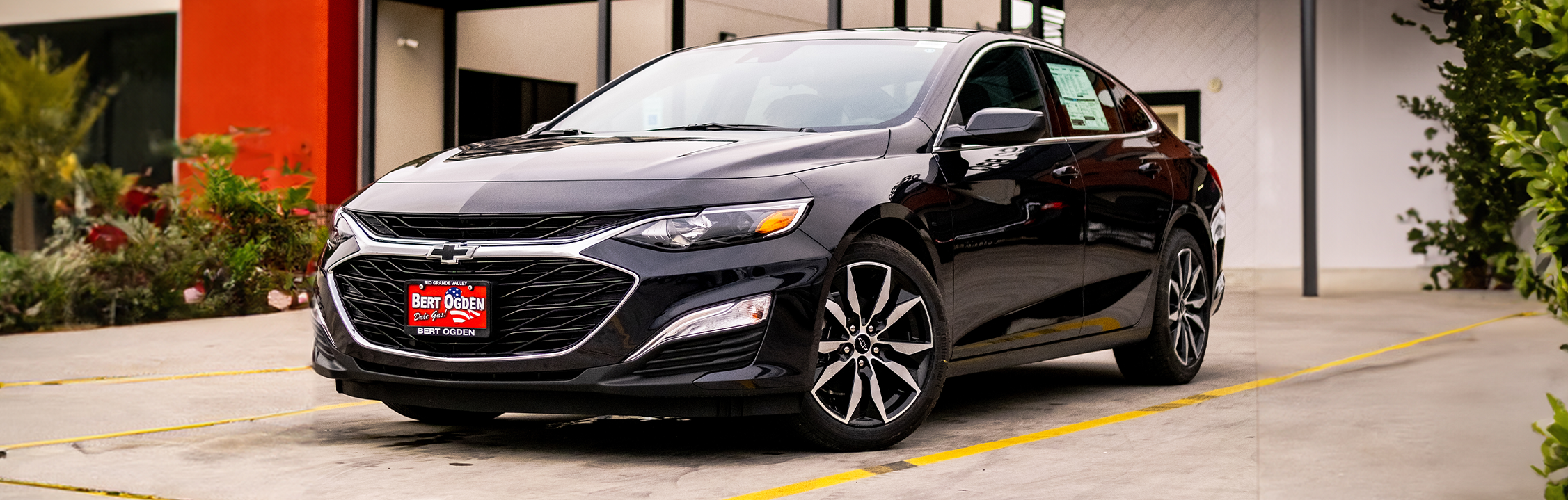 2022 Chevrolet Malibu parked in front of building