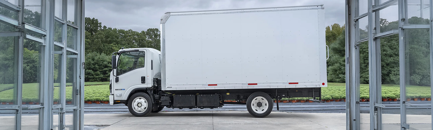 Side profile view of an Isuzu truck