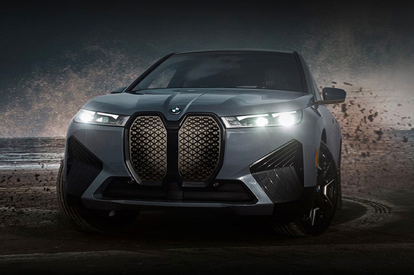 2022 BMW iX driving through mud
