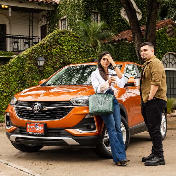 Couple with their new 2024 Buick