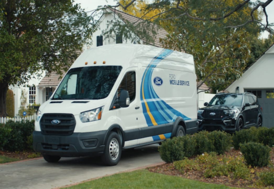 Ford Mobile Service van parked in a driveway. 