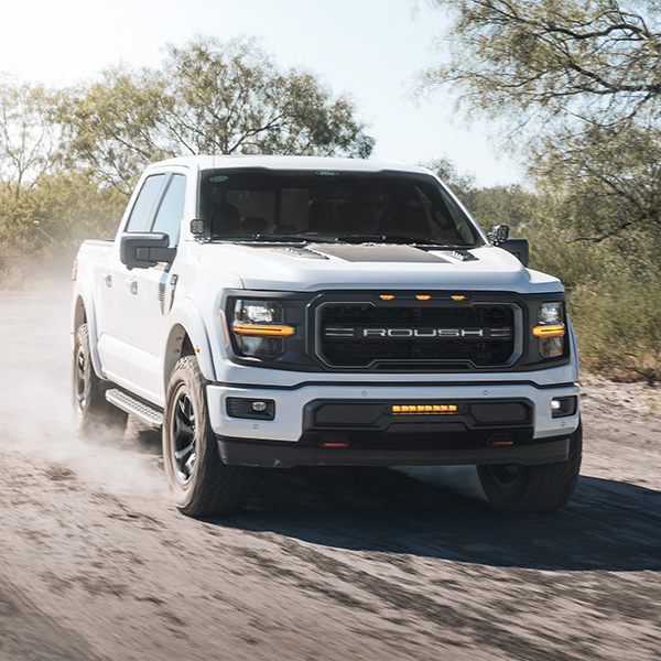 Front 3/4 shot of the Roush F-150 on dirt road.